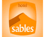 Sables hotel logo: orange shield with a mountain peak, the word 'hotel' at top and 'sables' at bottom.